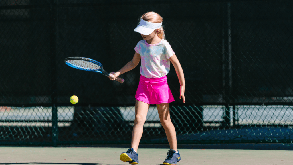 Girl playing Tennis